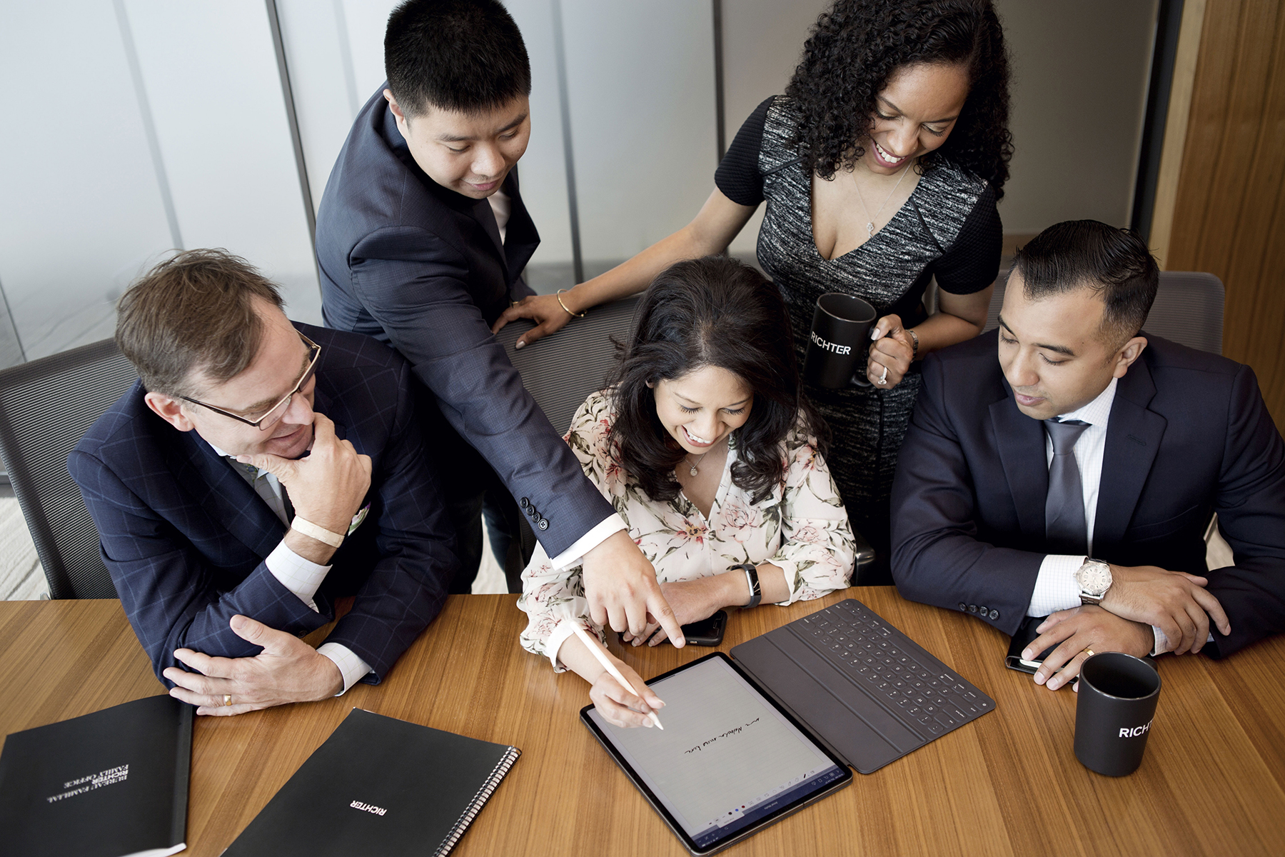 Richter Family Office team members in a meeting