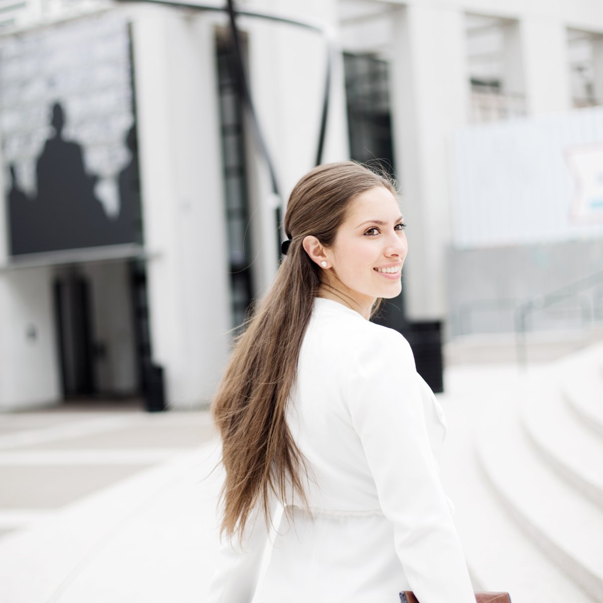 Richter team member walking outside and smiling