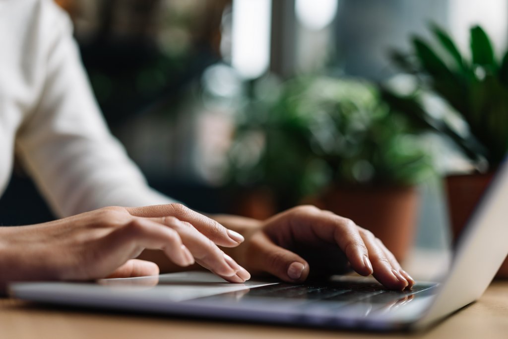 person typing on a computer 