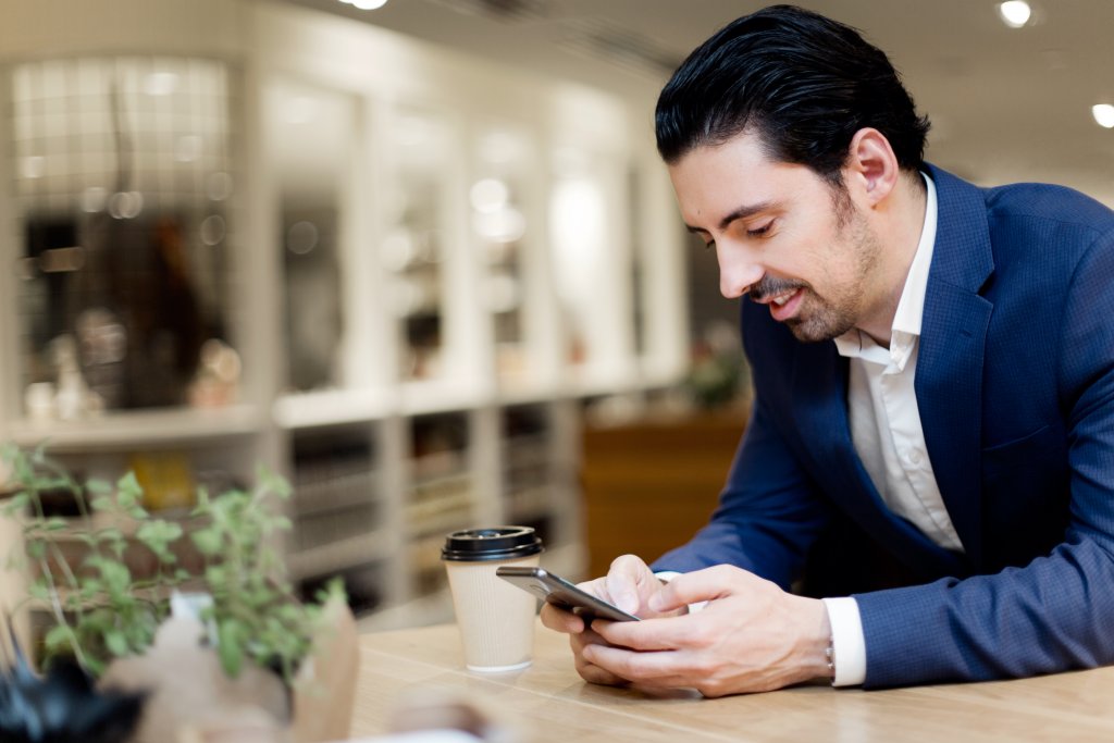 A person reading on his phone