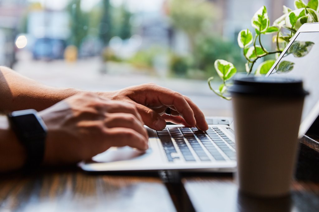 Hands on a computer keyboard