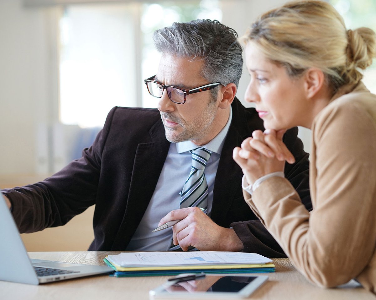 Team member talking to a colleague