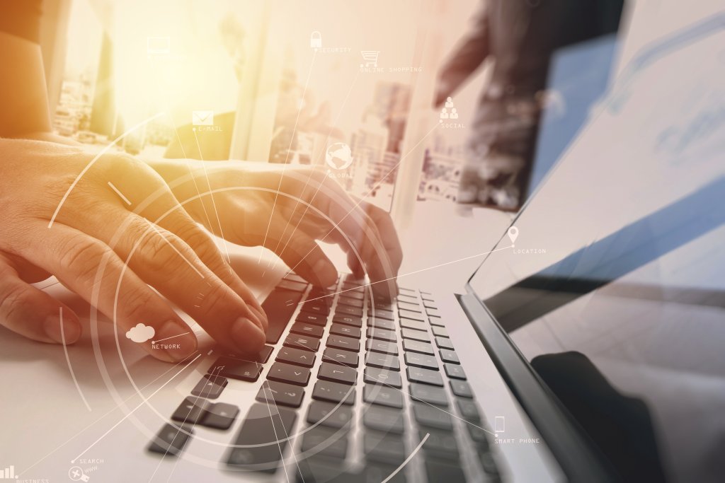 Hands on a computer keyboard